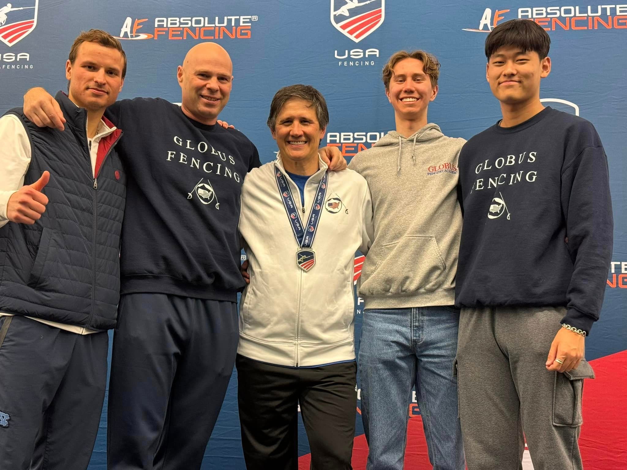 Paul Corteyn met Amerikaanse competitieschermers tijdens een clinic
